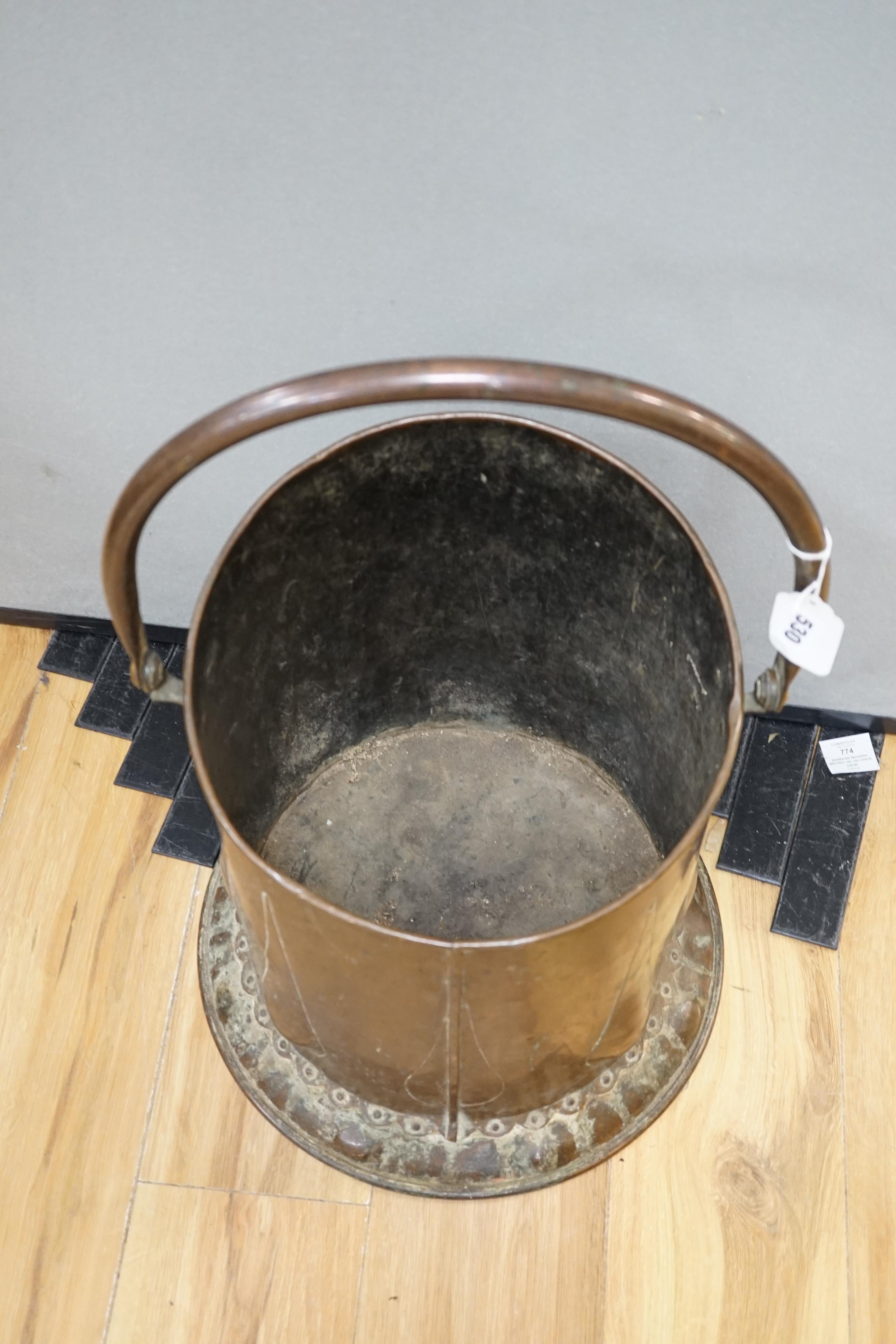An Arts and Crafts copper coal scuttle, c.1900, 40cm